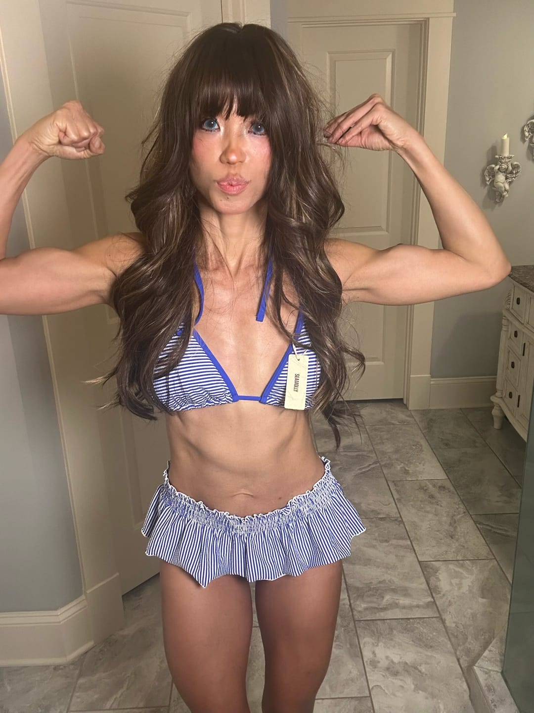 Customer photo review of Seamolly Striped Contrast Binding Smocked Peplum Skirtini Bikini Set