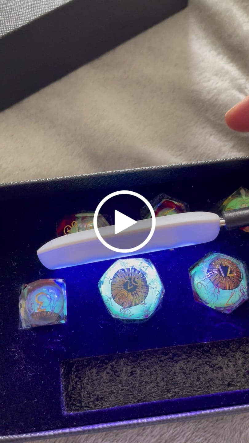 Customer video review of URWizards D&D Eyes(Glow in the Dark) Liquid Core Dice Set Multi-faceted Style