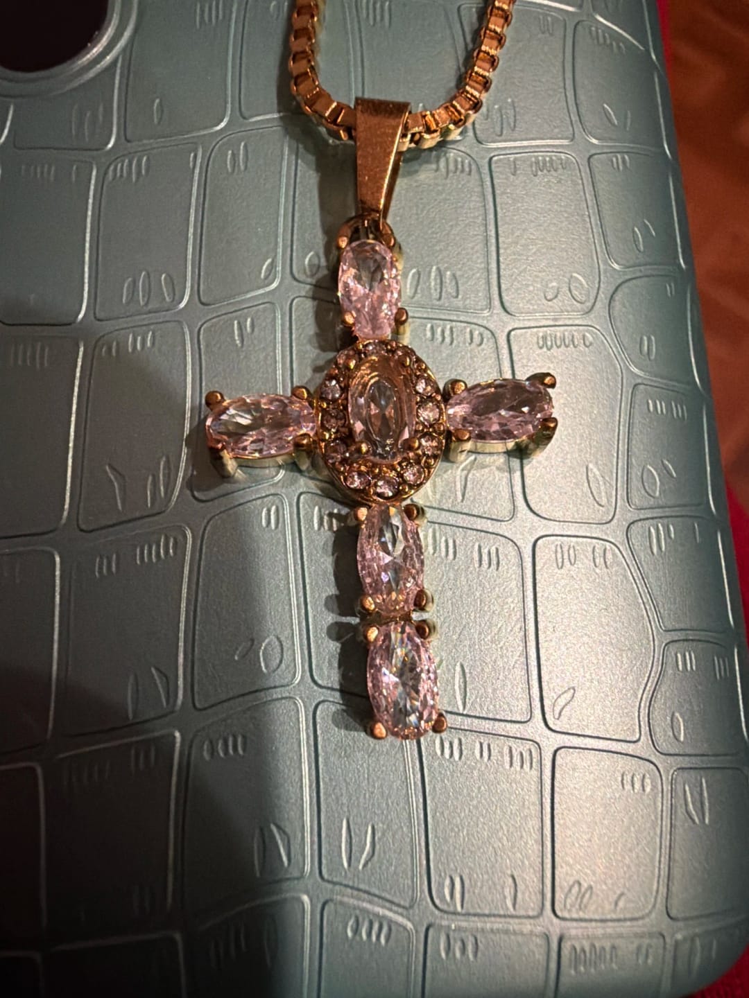 Customer photo review of Halo Glow Cross Necklace