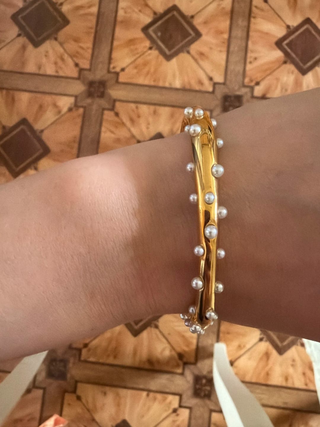 Customer photo review of Golden Pearl Charm Bangle