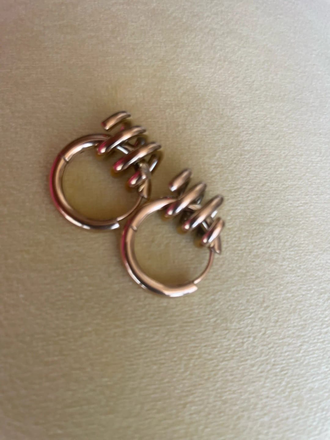 Customer photo review of Twist Wave Gold Splash Earrings