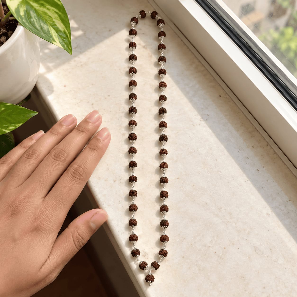 Customer photo review of Rudraksha Silver Mala