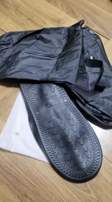 Customer photo review of Cubrebotas impermeable