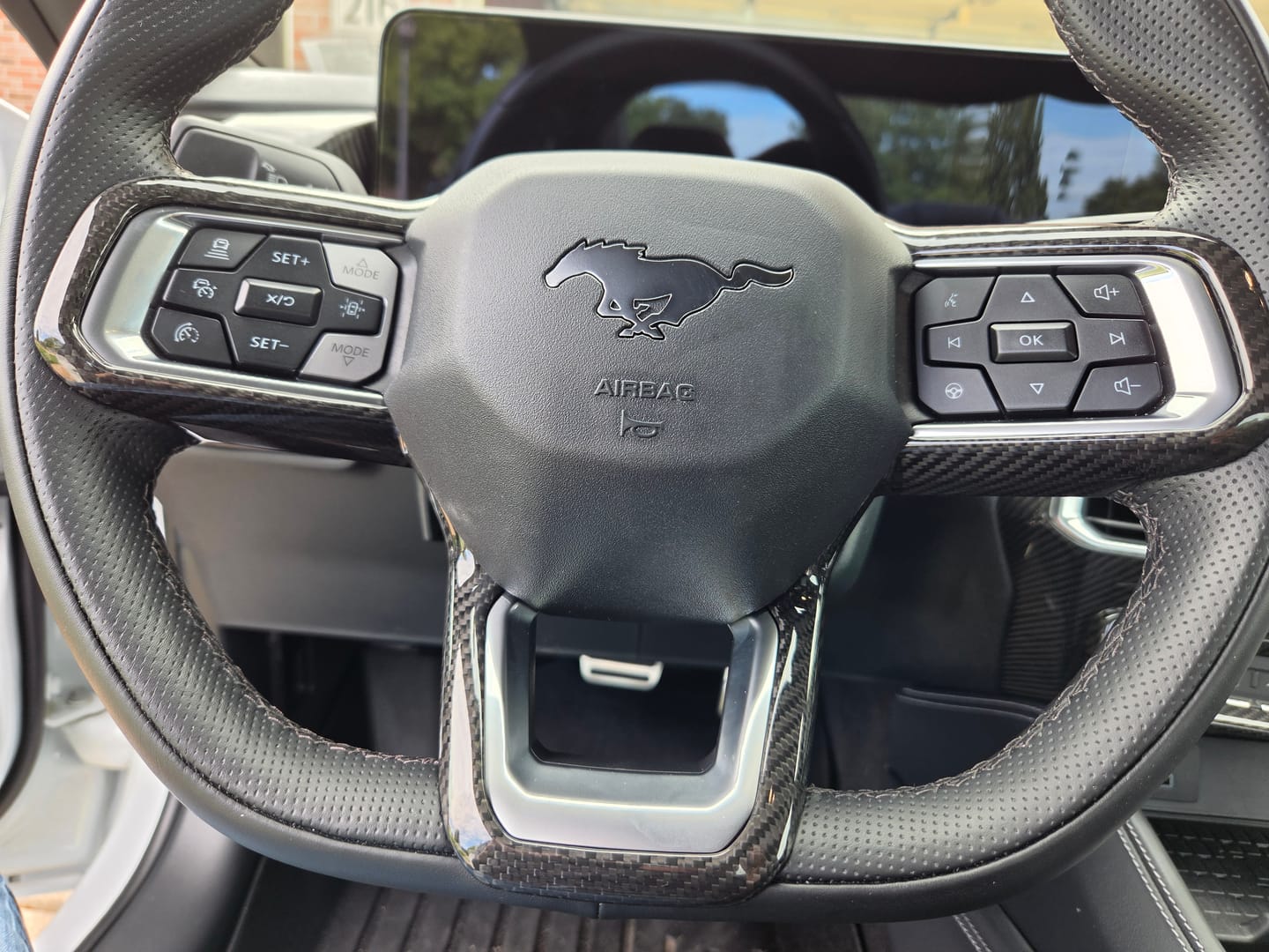 Customer photo review of 2024+ Ford Mustang DRY CARBON FIBER Steering Wheel Trim Cover