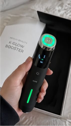 Photo d’une cliente avec le K‑Glow Booster
