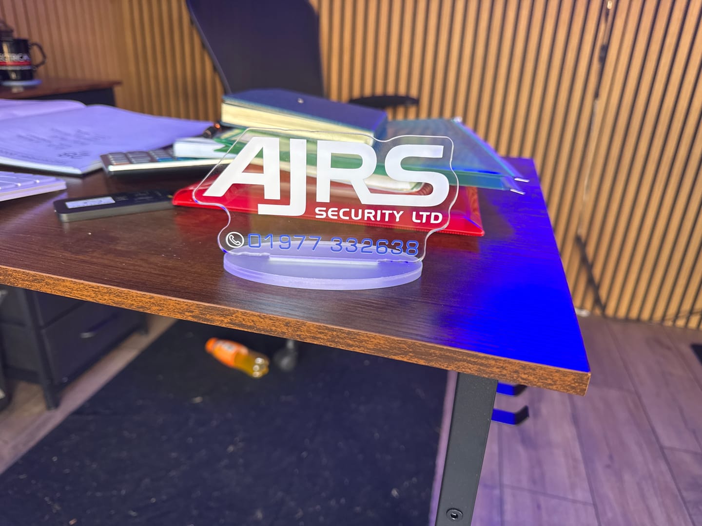 Customer photo review of 3 Tabletop Signs + 10 Keychains