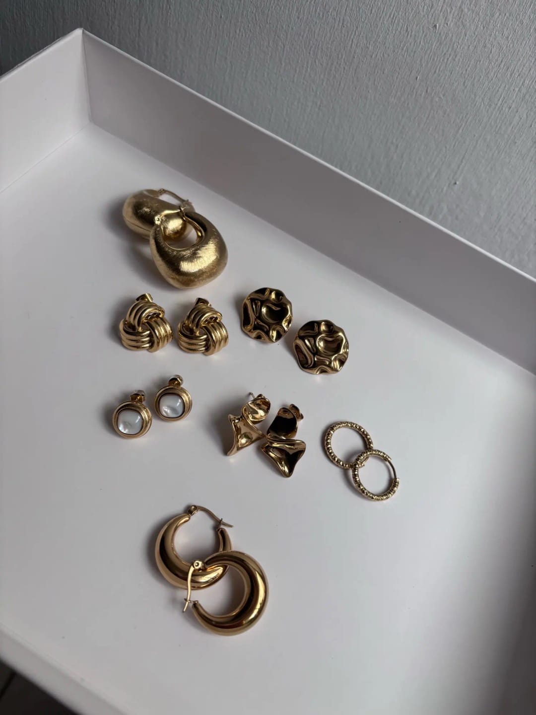 Customer photo review of Modern Edge Golden Hoops