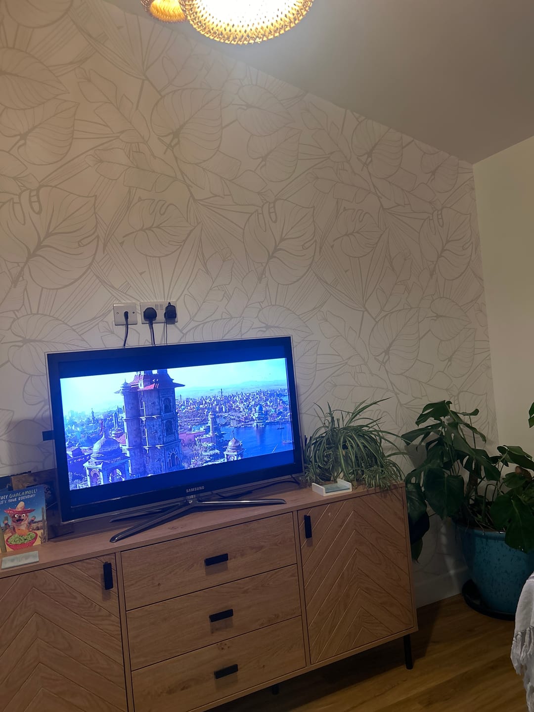 Customer photo review of Juniper Neutral - Muted Gold Tropical Leaves Wallpaper