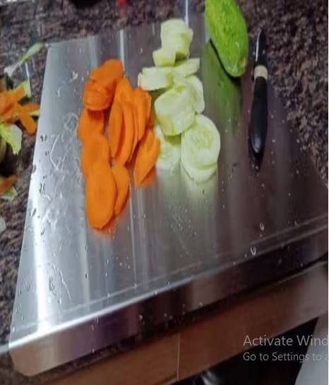 Customer photo review of Heavy-Duty Stainless Steel Countertop Chopping & Kneading Board