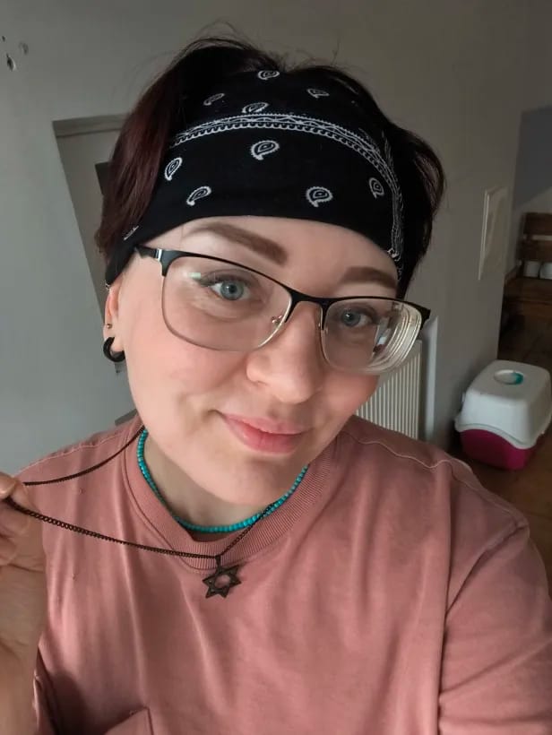 Customer photo review of Magen — Solid Stainless Steel Star of David Necklace