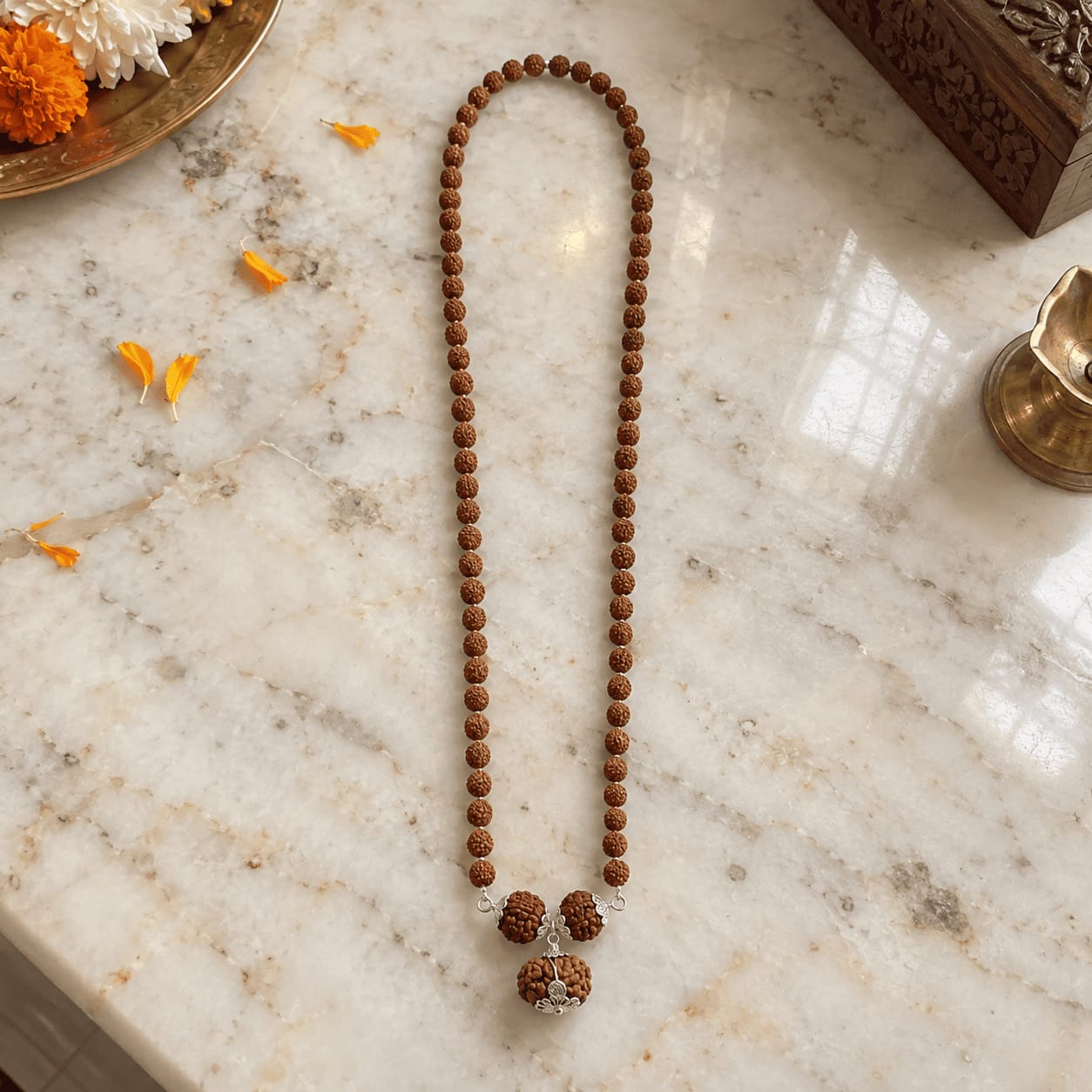 Customer photo review of 1-6-7 Mukhi Rudraksha Kavach (Indian)