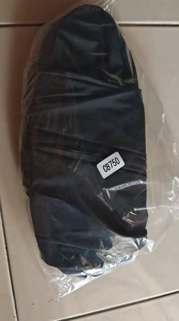 Customer photo review of Cubrebotas impermeable