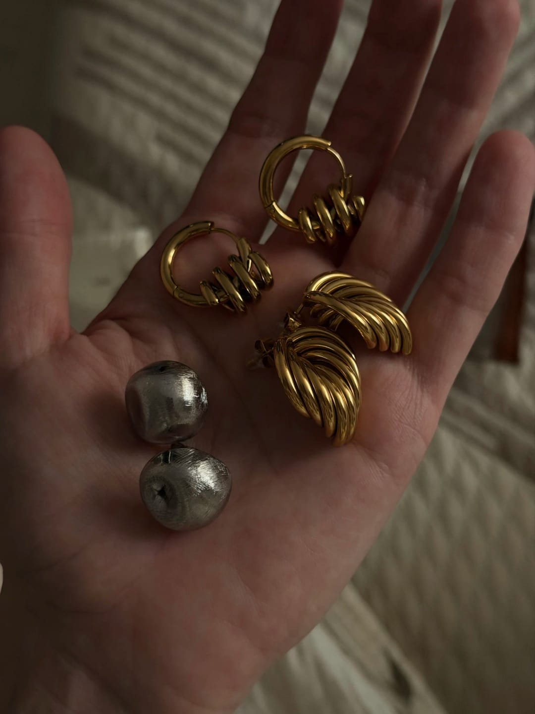 Customer photo review of Twist Wave Gold Splash Earrings