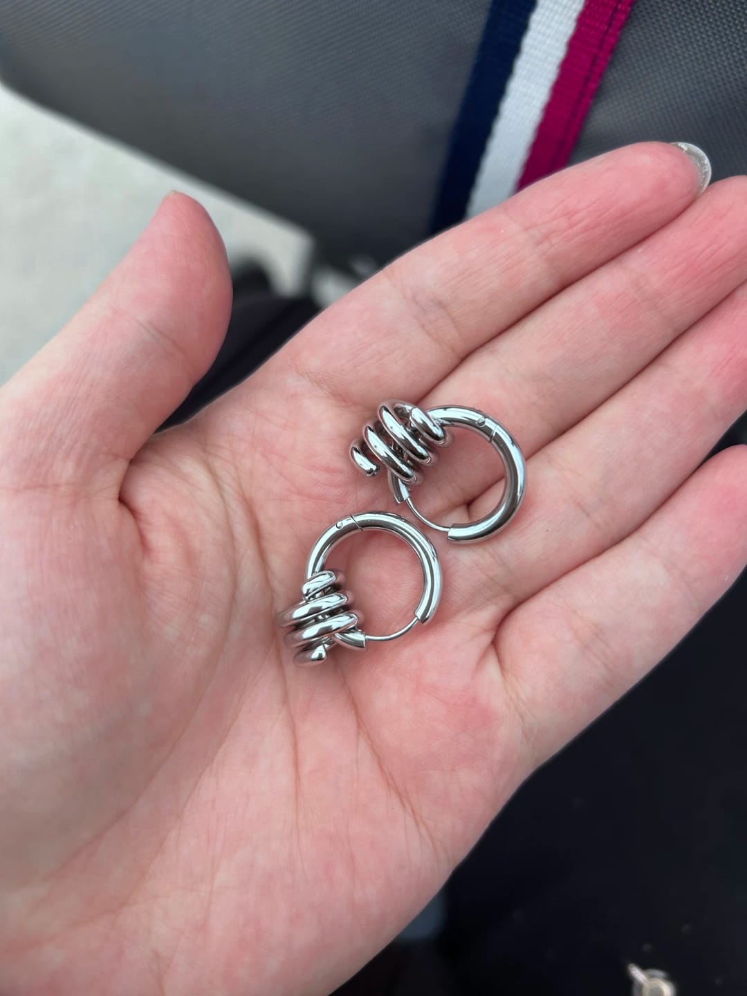 Customer photo review of Twist Wave Gold Splash Earrings