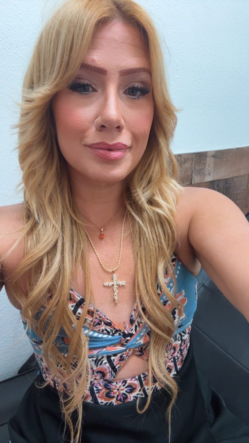 Customer photo review of FREE Today: Ornate Crystal Floral Cross Pendant Necklace: Token of Divine Shelter