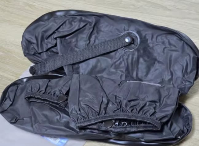 Customer photo review of Cubrebotas impermeable