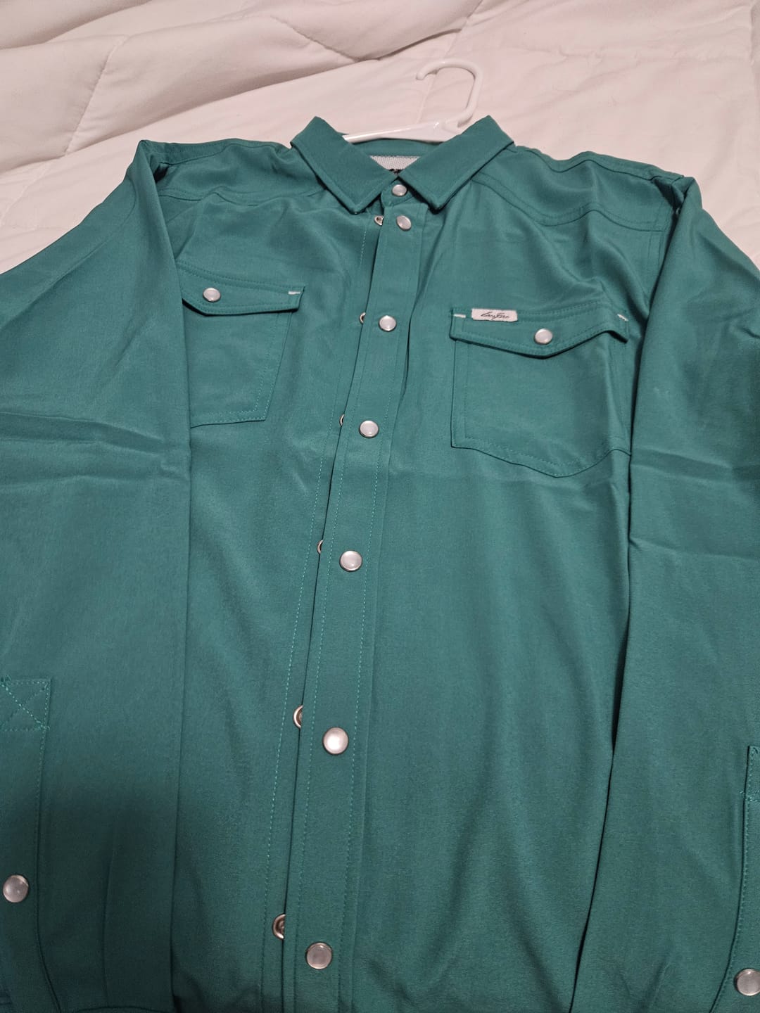 Customer photo review of San Jac Youth Long Sleeve Performance Pearl Snap Shirt - Teal