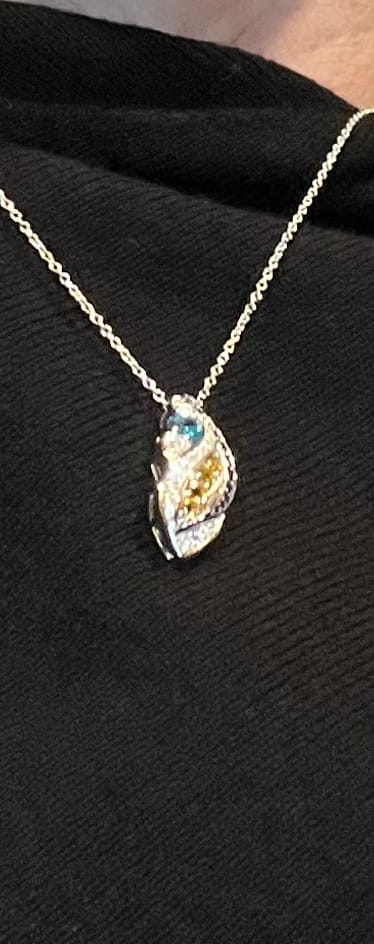 Customer photo review of Starry Night Inspired Moissanite Artistic Swirl Drop Necklace In Sterling Silver