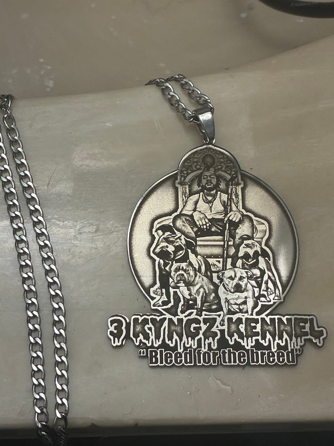 Customer photo review of Custom Logo Engraved Photo Pendant Necklace