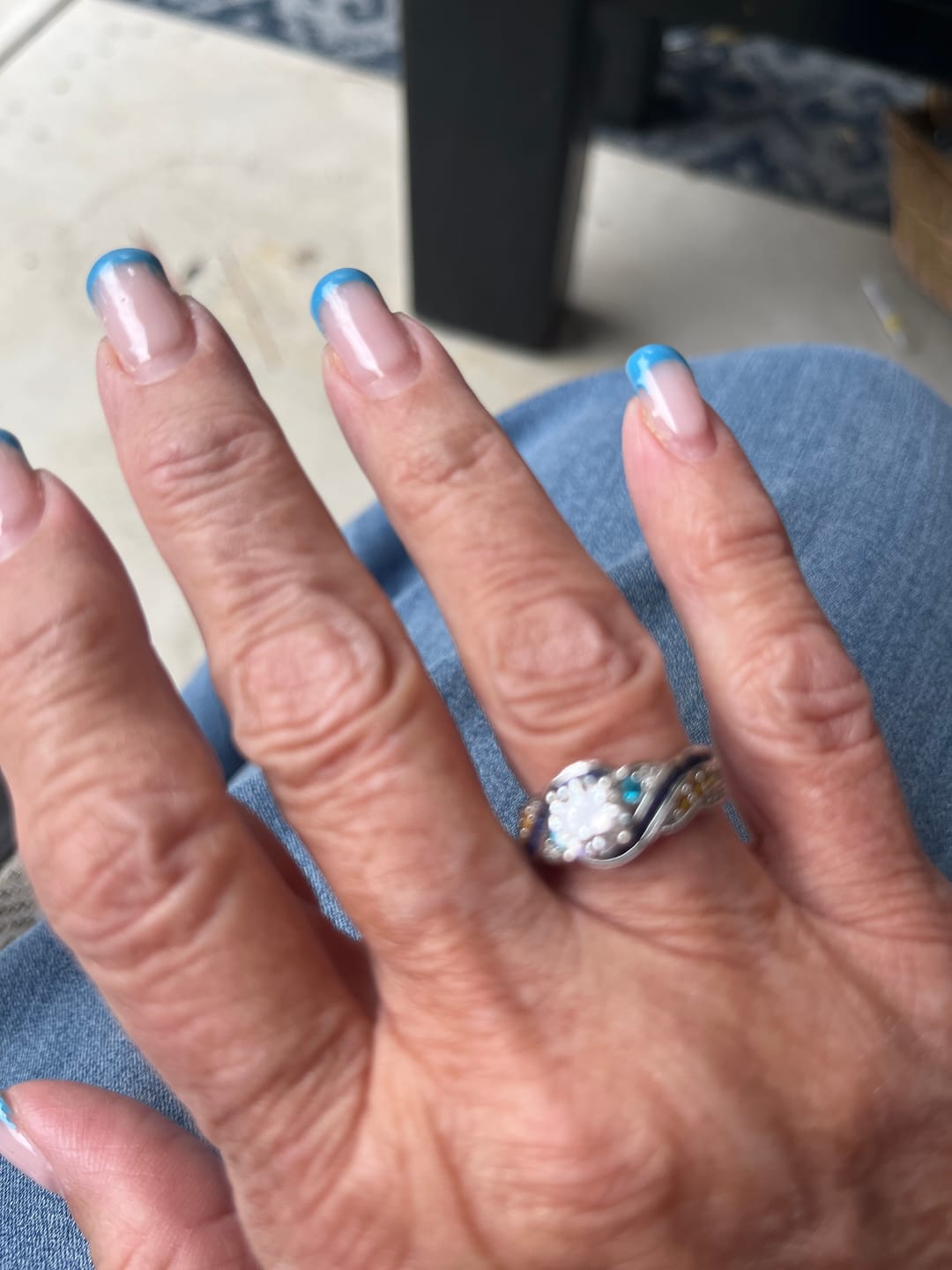 Customer photo review of Starry Night Moissanite Artistic Swirl Accent Engagement Ring