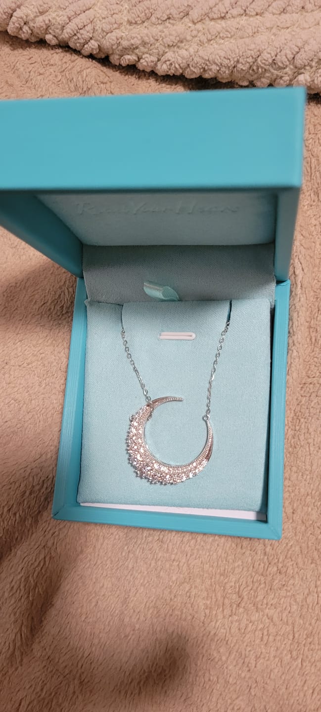 Customer photo review of Crescent Moon Moissanite Necklace In Sterling Silver