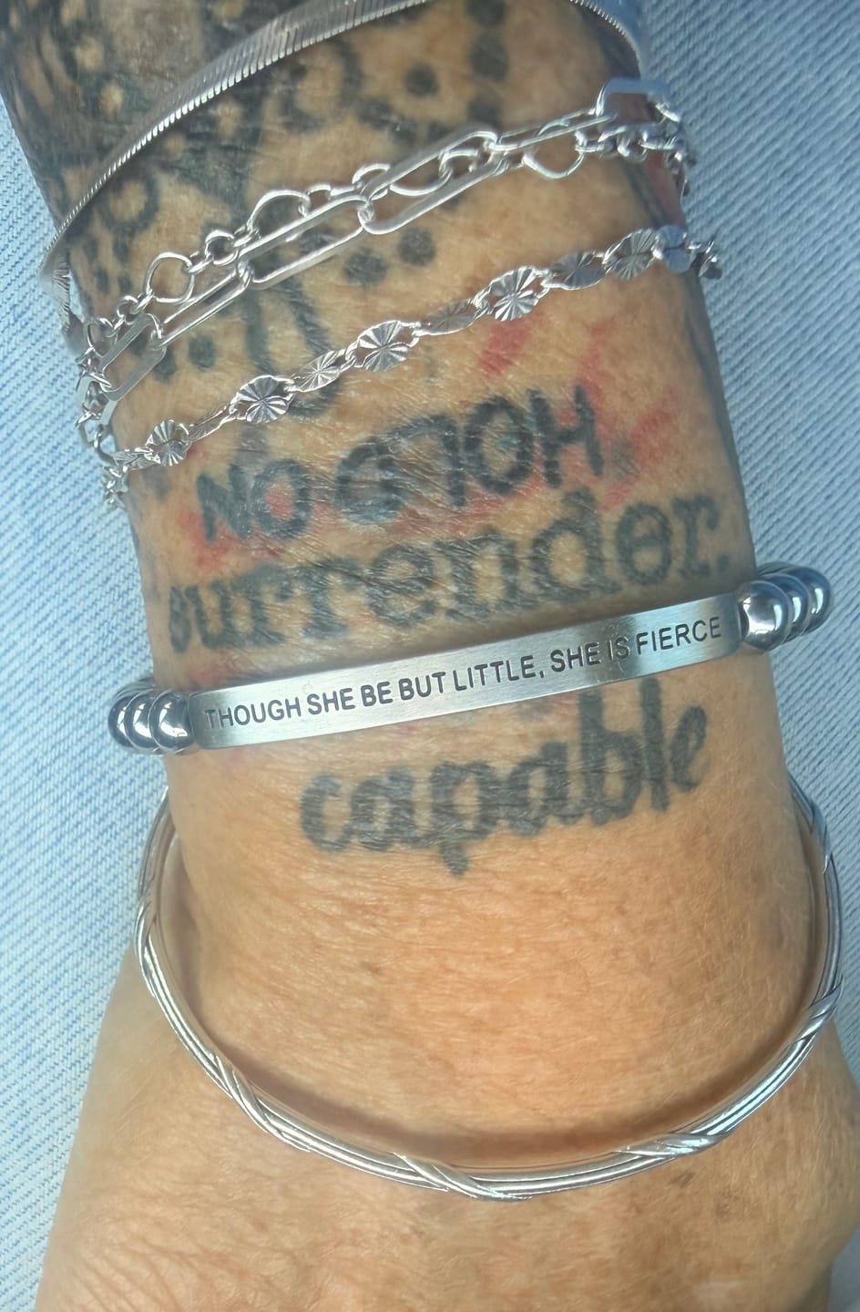Customer photo review of THOUGH SHE BE BUT LITTLE SHE IS FIERCE - ENGRAVED INSPIRATIONAL BRACELET
