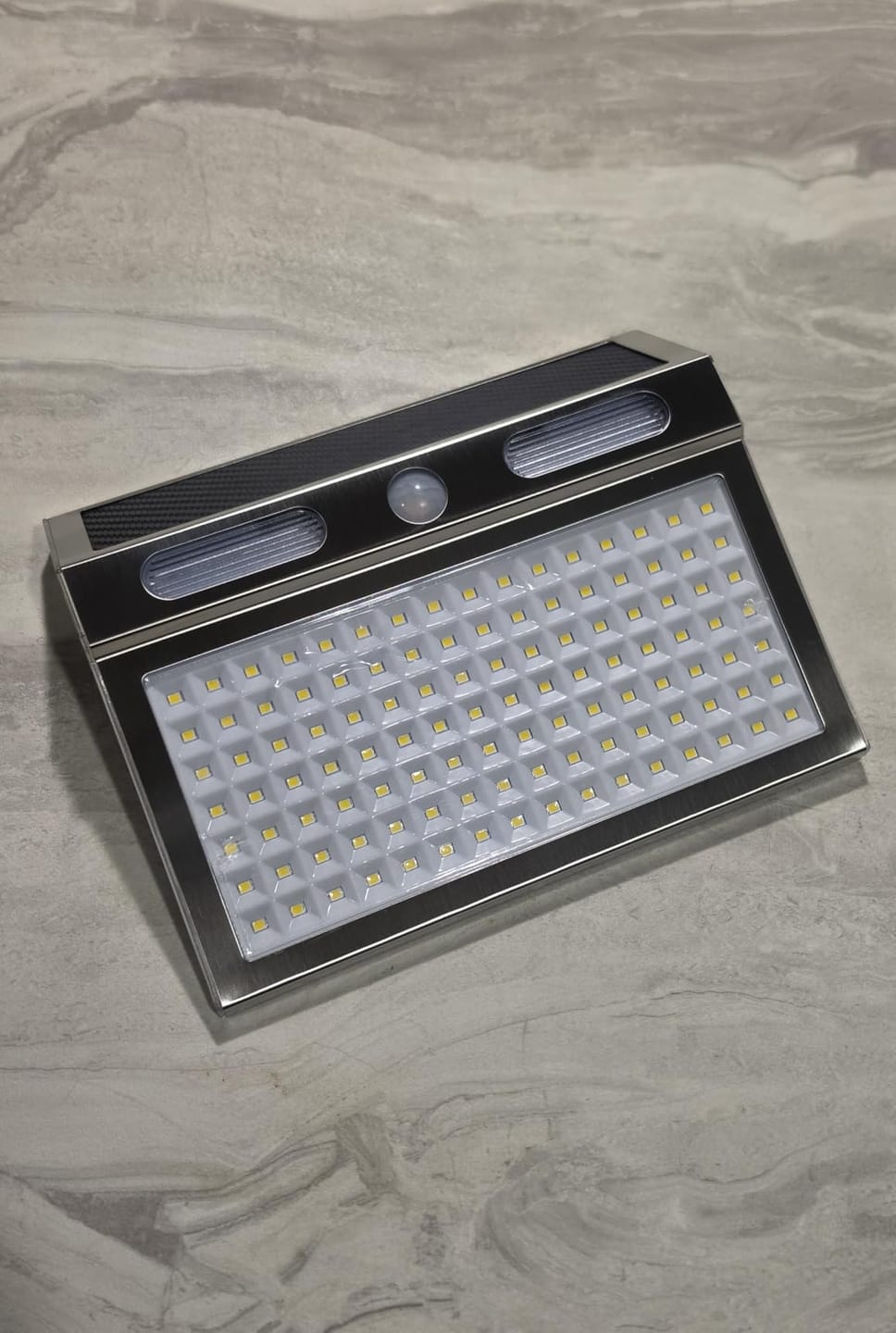 Customer photo review of Solar Sensor Wall Light Stainless Steel, Warm White DailyLight Super Bright