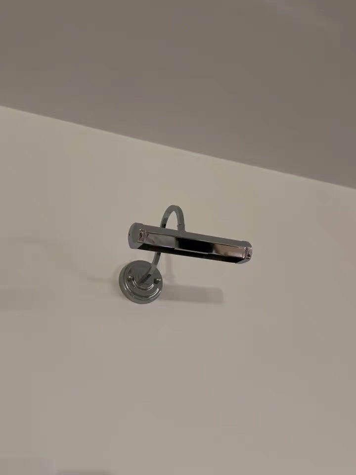 Customer photo review of Adjustable Wall Light, Metal Wall Sconce, Chrome or Gold