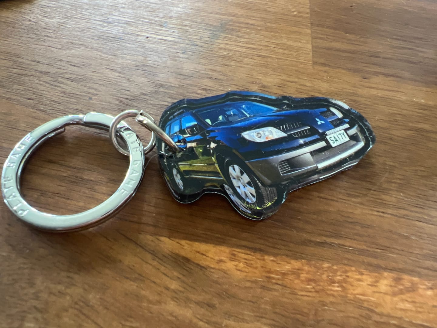 Customer photo review of PG Mini Custom Keychain