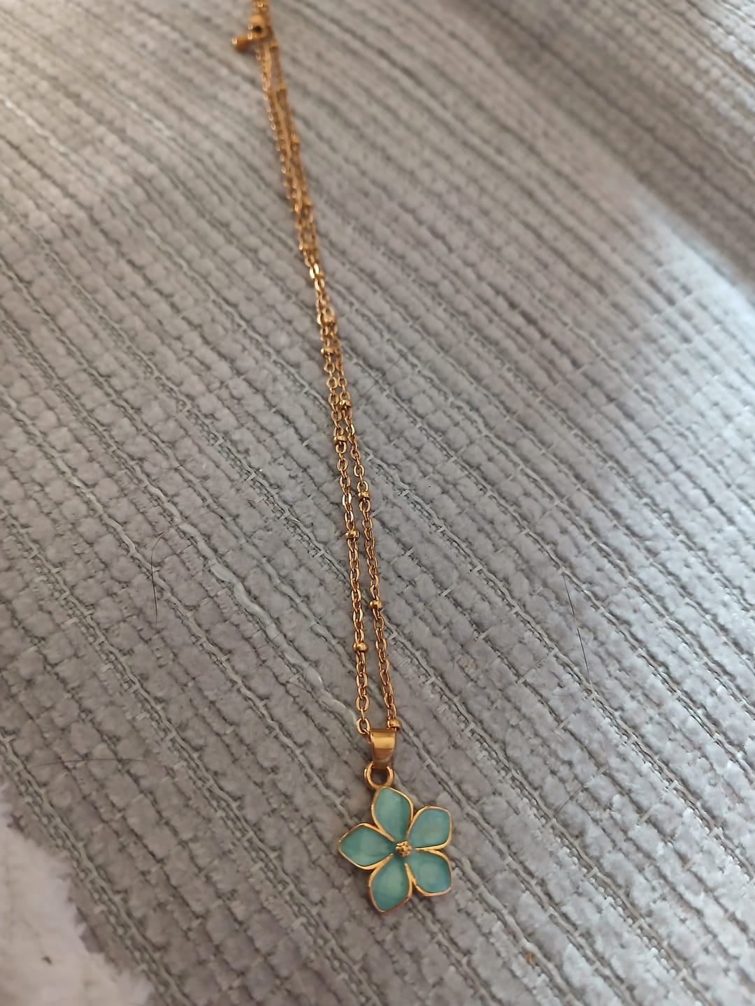 Customer photo review of Turquoise Sakura Bloom Gold Necklace