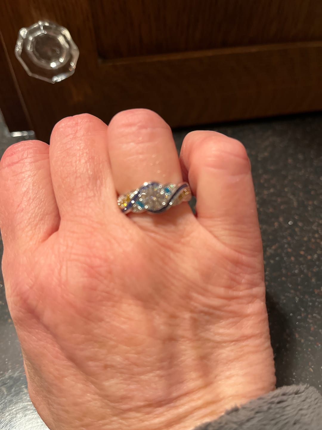 Customer photo review of Starry Night Moissanite Artistic Swirl Accent Engagement Ring