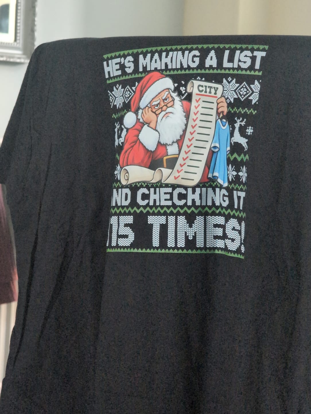 Customer photo review of HE'S MAKING A LIST AND CHECKING IT 115 TIMES