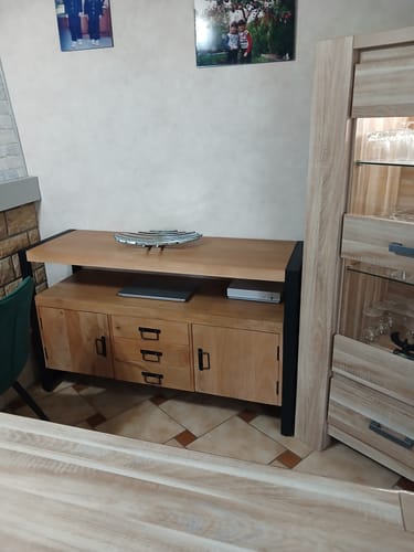 Client's wooden sideboard furniture in a home living space setting