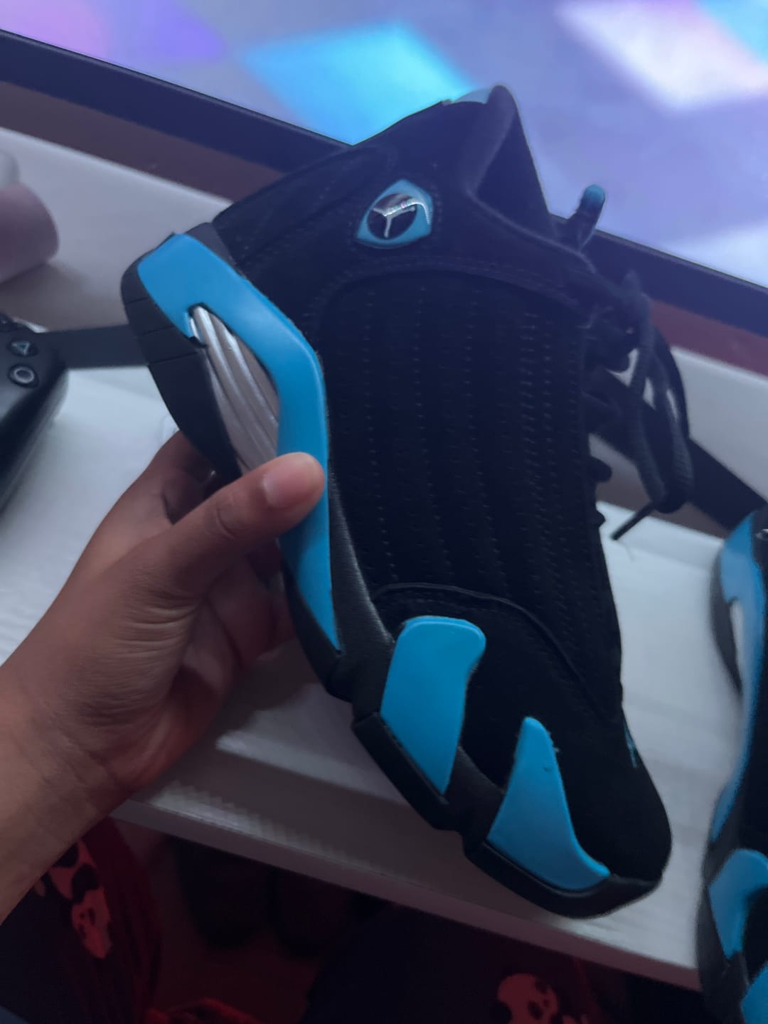 Customer photo review of Air Jordan 14 Retro Black and University Blue
