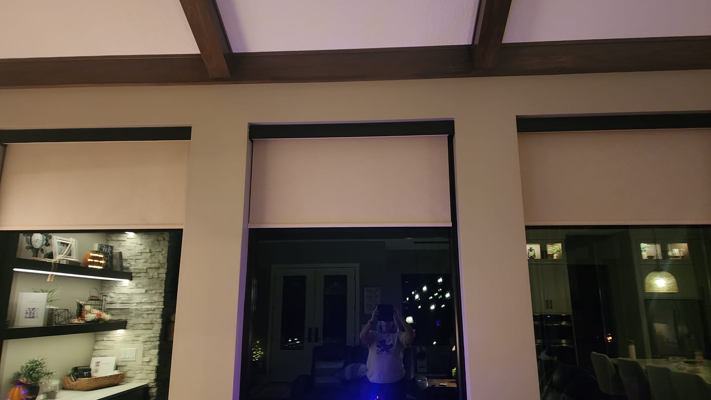 Customer photo review of SmartWings Motorized Light Filtering Roller Shades 70% Blackout Safari