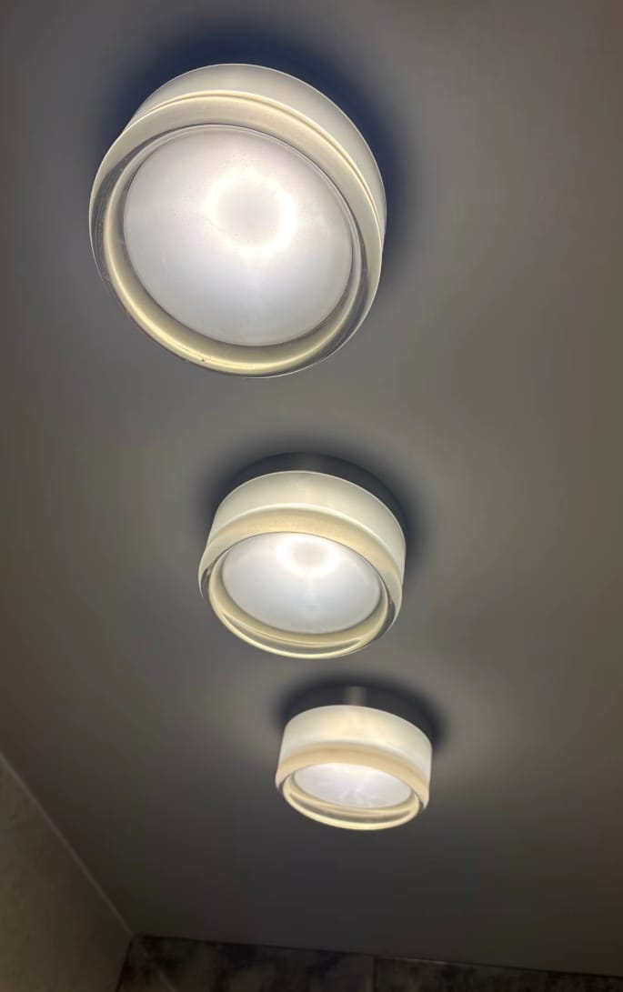 Customer photo review of Round Amber Glass Wall Sconce with Warm Light