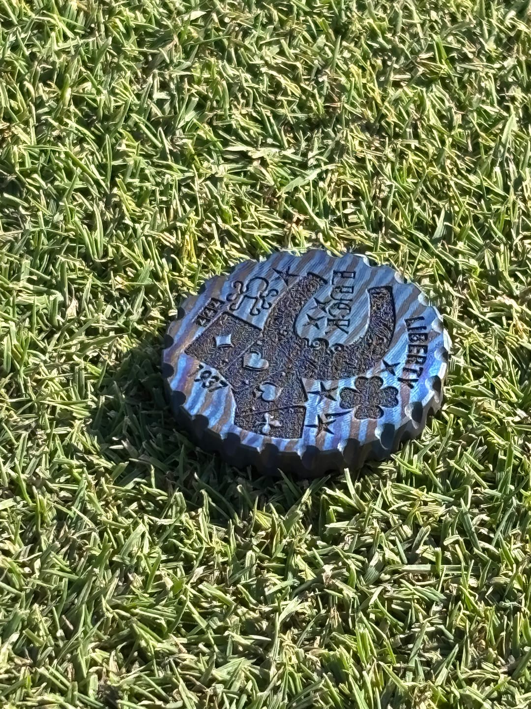 Customer photo review of HOBO LUCK GOLF BALL MARKER - TIMASCUS EDITION
