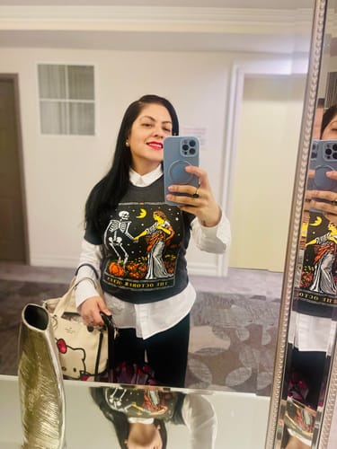 Customer's October Queen Tarot Card Tee worn over a white collared shirt, reflecting in a mirror.