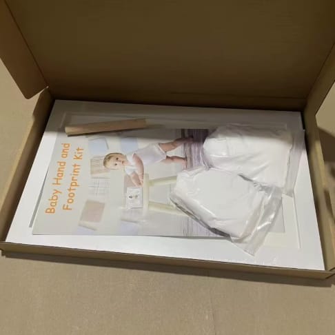 Customer photo review of Baby Handprint & Footprint Keepsake Frame