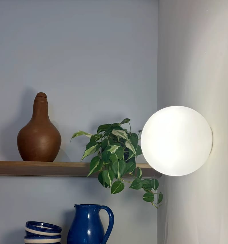 Customer photo review of Round Glass Globe LED Wall Sconce