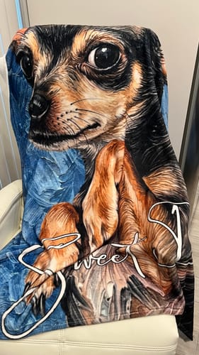 Customer's personalized pet throw blanket featuring a detailed oil-painting style portrait of a dog.