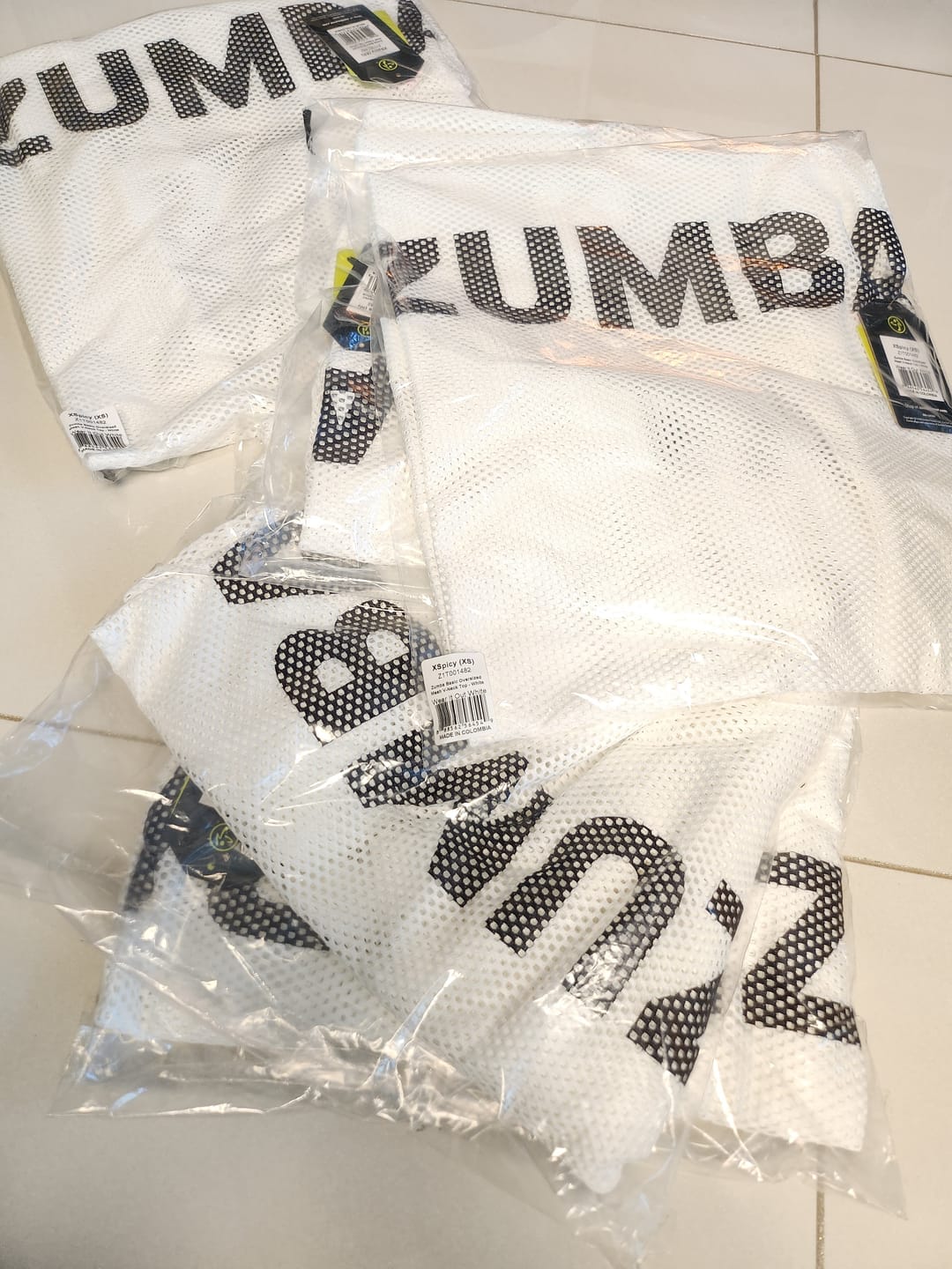 Customer photo review of Zumba Basic Oversized Mesh V-Neck Top - Black