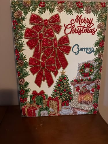 Customer's Personalized 3D Pearl Art canvas featuring red bows, a Christmas tree, and fireplace.