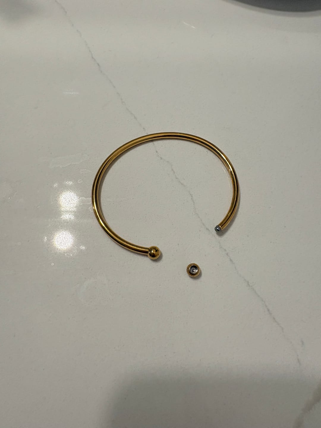 Customer photo review of Gold Penelope Bangle