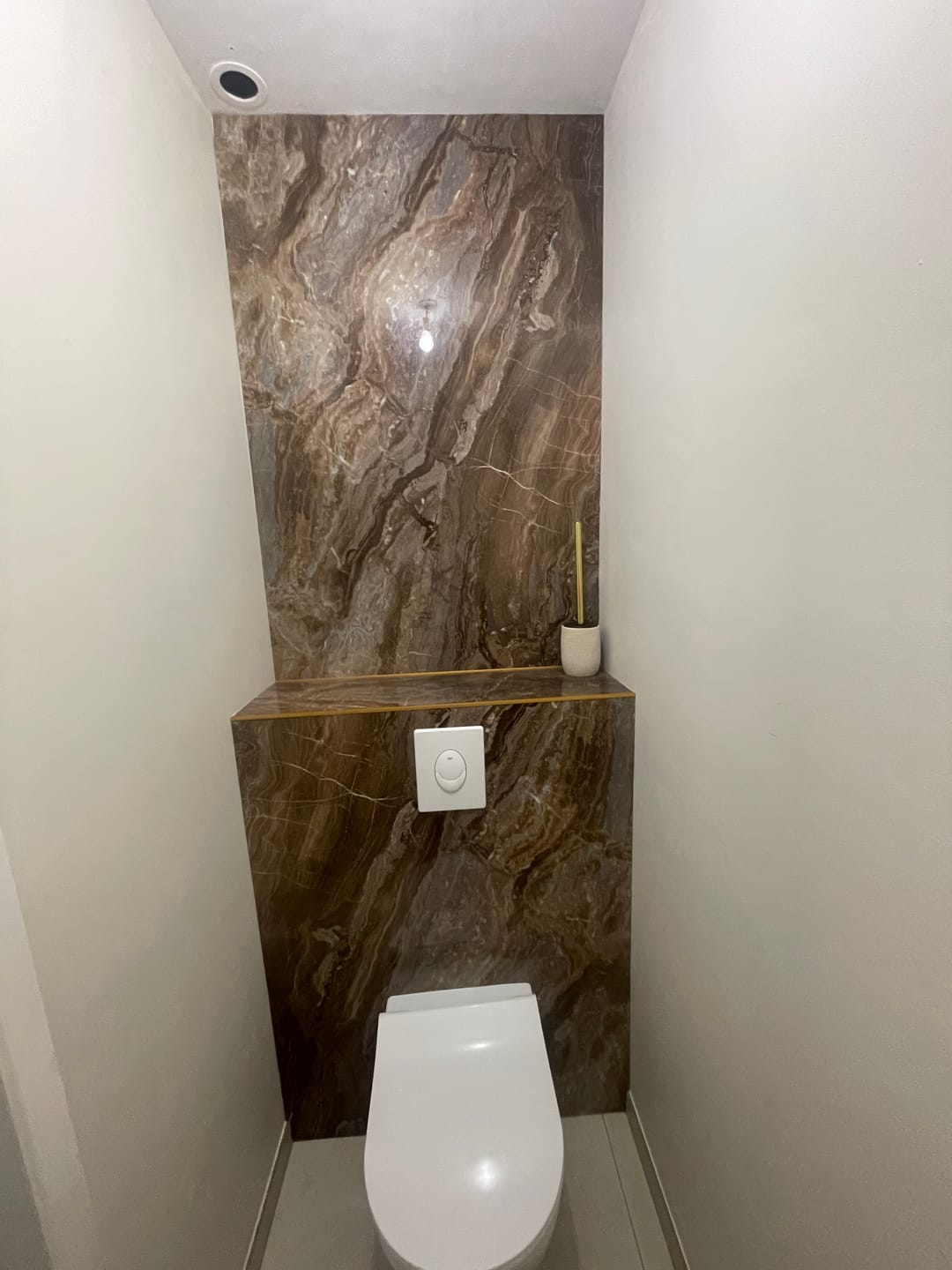 Customer photo review of Plaque Mural PVC Imitation Marbre – Onyx Cuivré Royal 260 x 120 CM