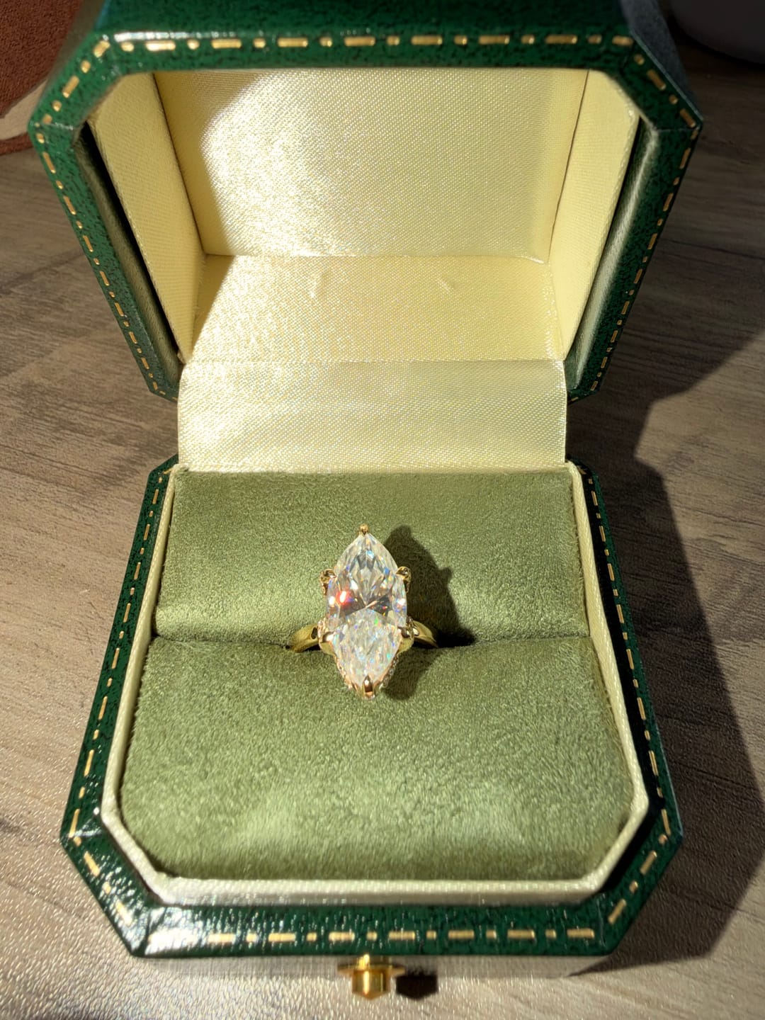 Customer photo review of Custom Order: 5 CT Marquise Moissanite Ring in 18k Yellow Gold and 3.5mm Band (For Abbi Zornes)