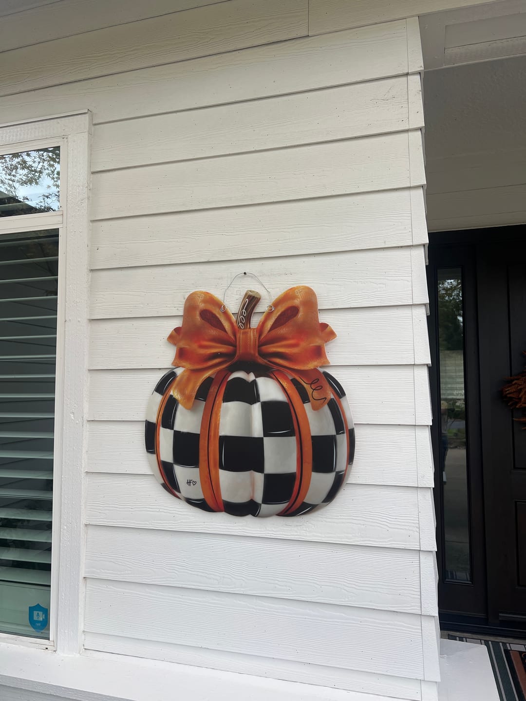 Customer photo review of Elegant Checkered Pumpkin Door Hanger