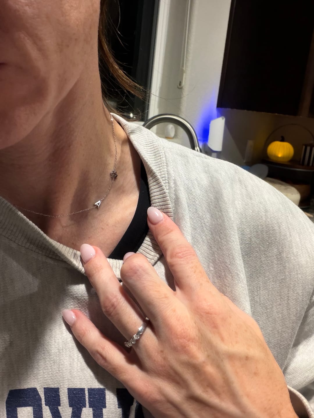 Customer photo review of 14K Gold Sideways Paw Initial Necklace