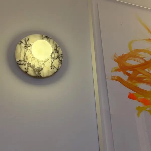 Customer photo review of Round Marble Globe Wall Sconce