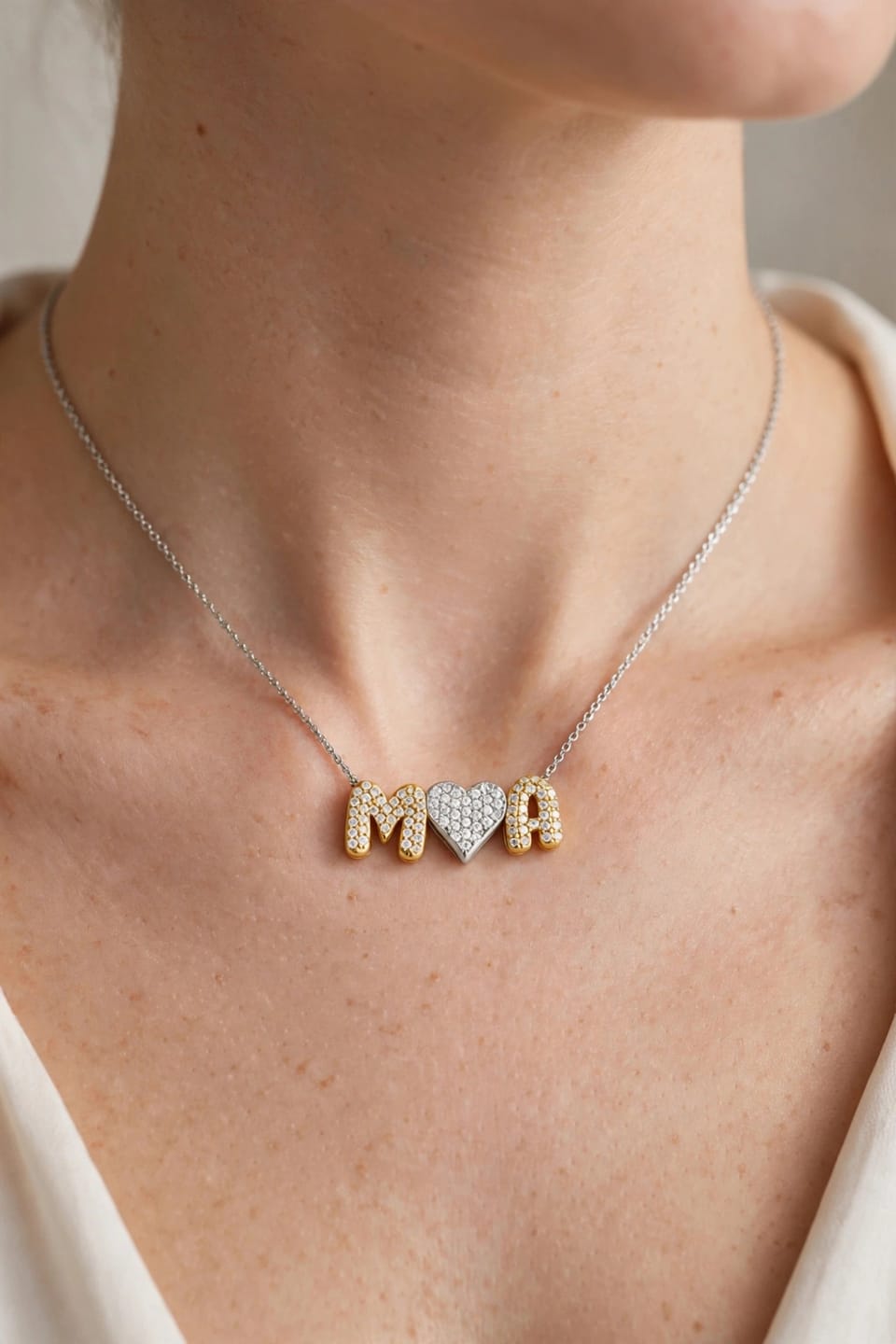 Customer photo review of Collar Combinado Corazon Con Inicial Mini Bubble Zirconias